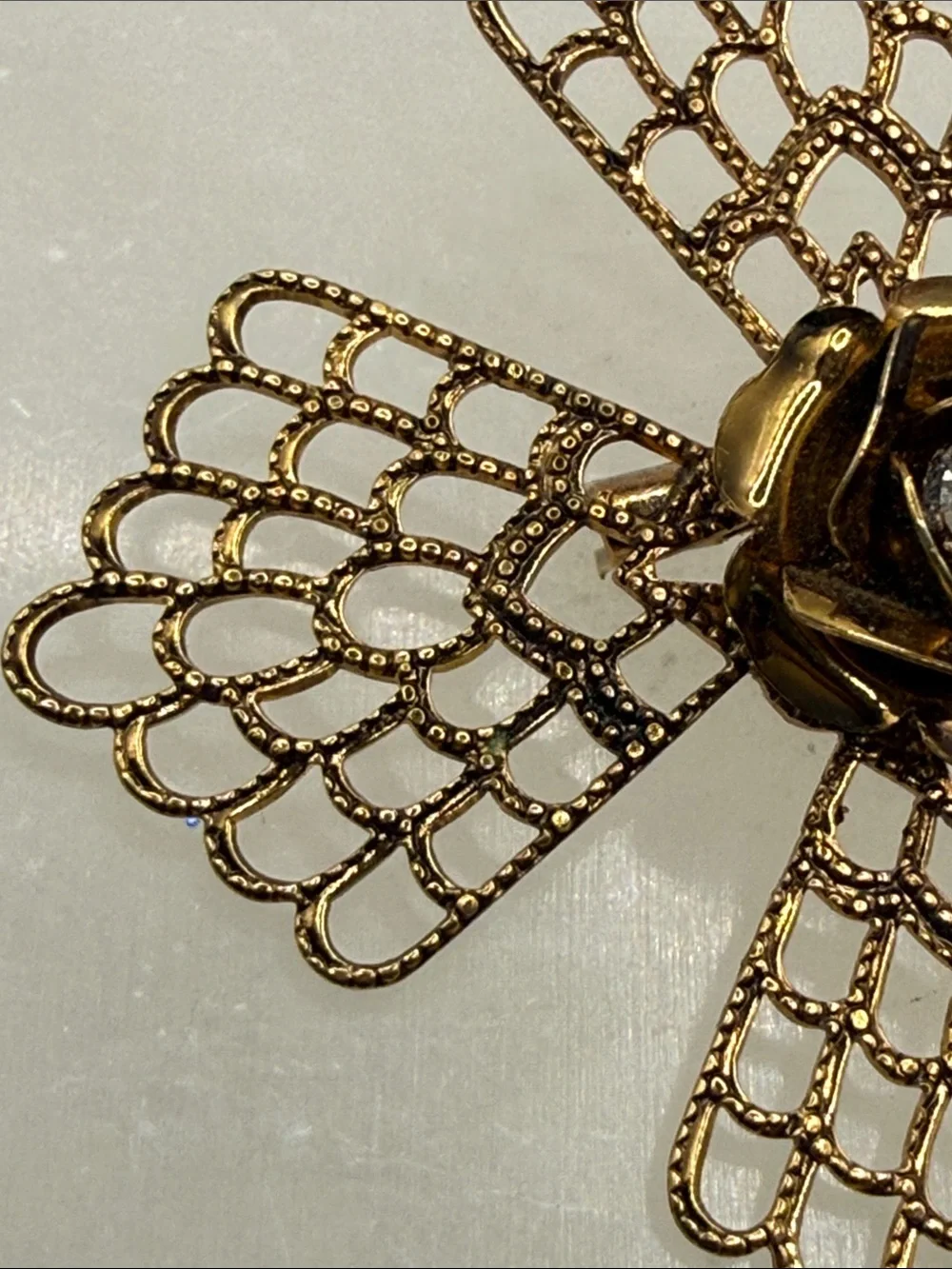 Gold Filigree Floral Brooch with Clear Crystal Center